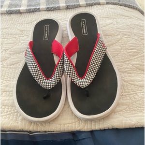 Nikegolf sz 10 flip flops.  EUC